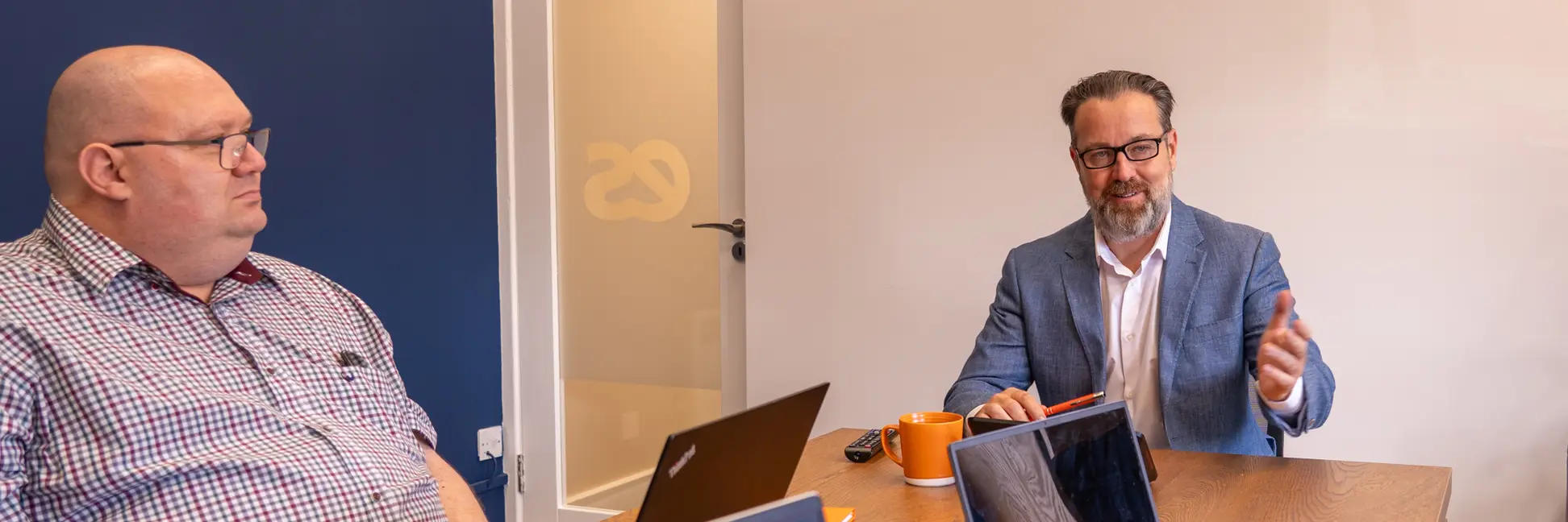 A meeting in the Enterprise Solutions office