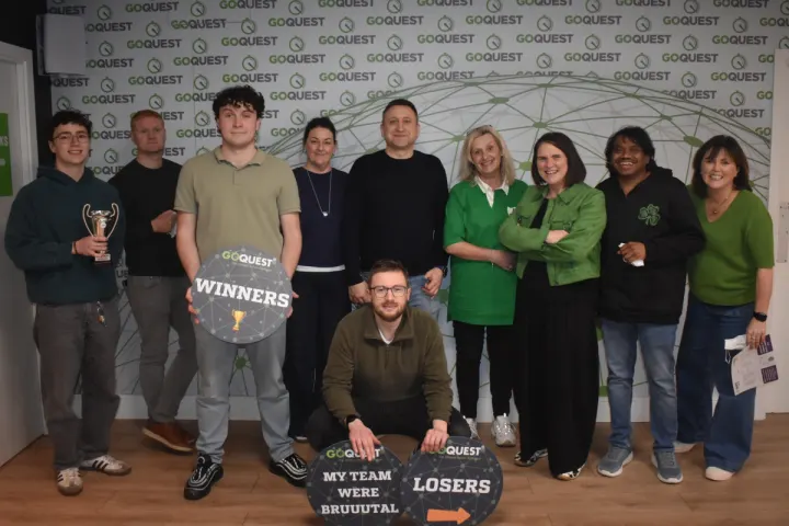 The team with trophies after a Go Quest challenge