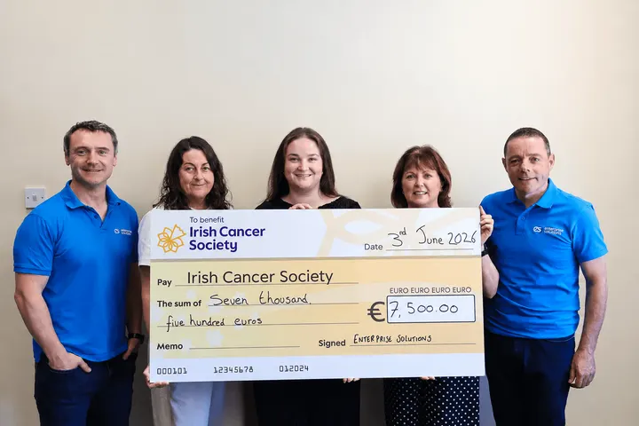 Presenting a €7,500 cheque to the Irish Cancer Society